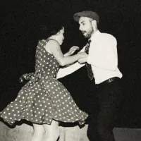 man and woman dancing